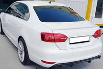Volkswagen Jetta 2011-2018 OEM Heckspoiler (grundiert zum Lackieren) Foto 1