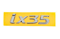 Hyundai IX-35 2010-2015 Emblem IX35 86310-2S010 (135mm x 37mm) Foto 1