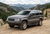 Jeep Grand Cherokee WJ 1999-2004 Trittbretter Allmond Black (2 Stk., Aluminium) Foto 1