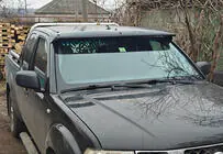 Nissan Navara 2006-2015 Sonnenblende für Frontscheibe (am Rahmen) Foto 1
