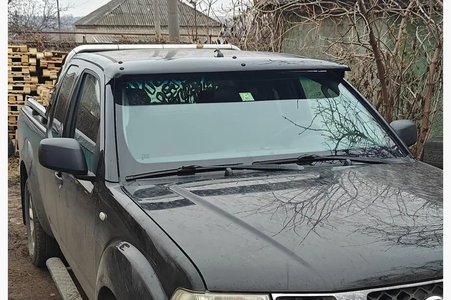 Nissan Navara 2006-2015 Sonnenblende für Frontscheibe (am Rahmen) Image