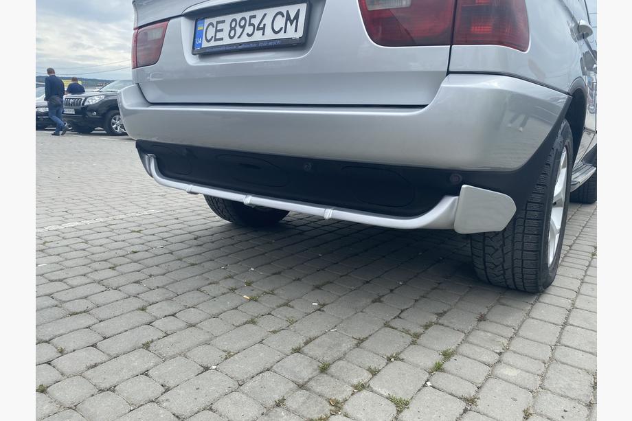 BMW X5 E53 1999–2006 Heckstoßstangenabdeckung (grundiert zum Lackieren) Image