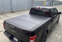 Mitsubishi L200 2015-2024 4-teilige Laderaumabdeckung (2019-2024) Foto 1