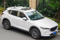 Mazda CX-5 2017–2025 Dachträger Quertraversen für integrierte Reling OEM (2 Stk.) Schwarz Foto 2
