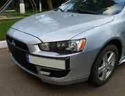 Mitsubishi Lancer X 2008- Kennzeichenhalter (Kunststoff) Foto 1