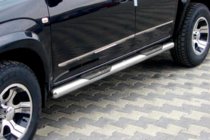 Kia Carens 1999-2012 Seitliche Edelstahlrohre Foto 1