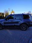 Mitsubishi Pajero Wagon IV 2006-2021 Dachreling Chrom türkisches Design (2 Stk) Foto 3