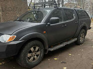 Mitsubishi L200 2006-2015 Seitenstufen Dakar V2 mit LED (2 Stk, Metall) Foto 1