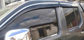 Nissan Navara 2006-2015 Windabweiser mit Chromleisten (4 Stk., Sunplex Chrome) Foto 2