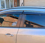 Opel Astra J 2009-2015 Chrom Windabweiser mit Leiste HB/SD (4 Stk, Sunplex Chrome) Foto 1
