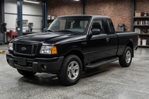 Ford Ranger 2002-2006 Seitenschweller Tayga Black (2 Stk., Aluminium) Foto 1